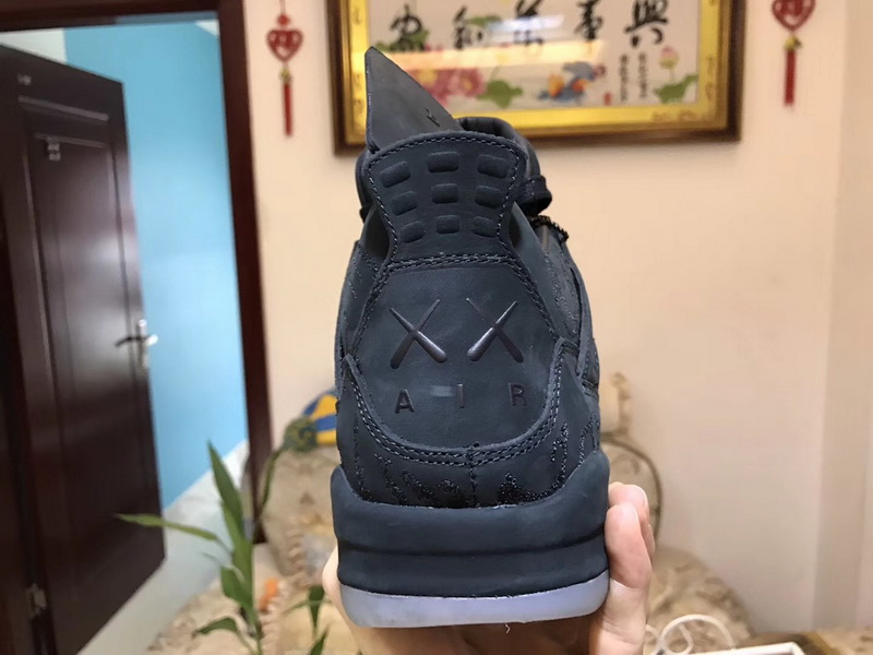 Authentic KAWS x Air Jordan 4 “Cool Grey Black”